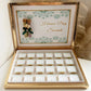 Box Chocolat Henna Day - Coffret doré avec chocolats personnalisés, tubes décoratifs et détails élégants, parfait pour célébrations Henna Day